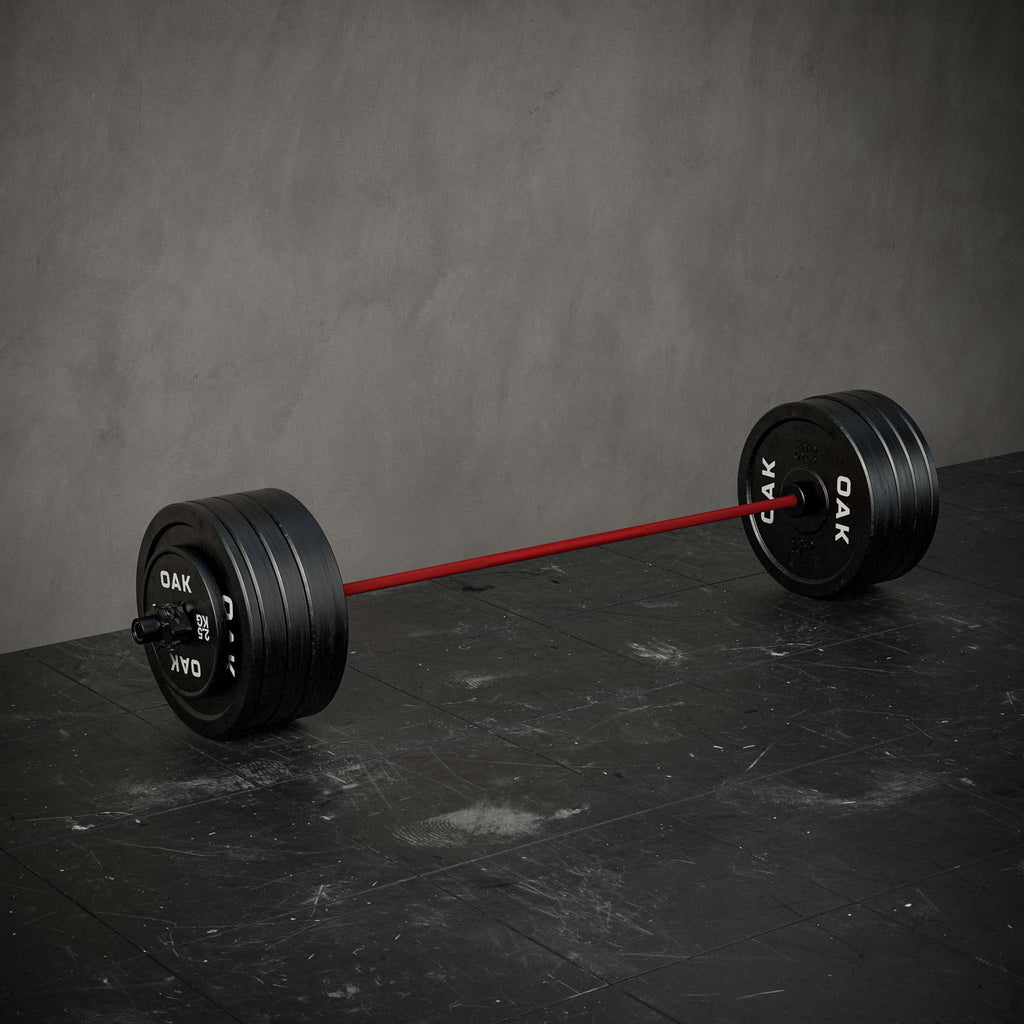 Ett skivstångsset med Crossfitstång för kvinnor och flera viktskivor